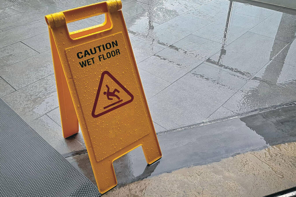 add wet floor signs